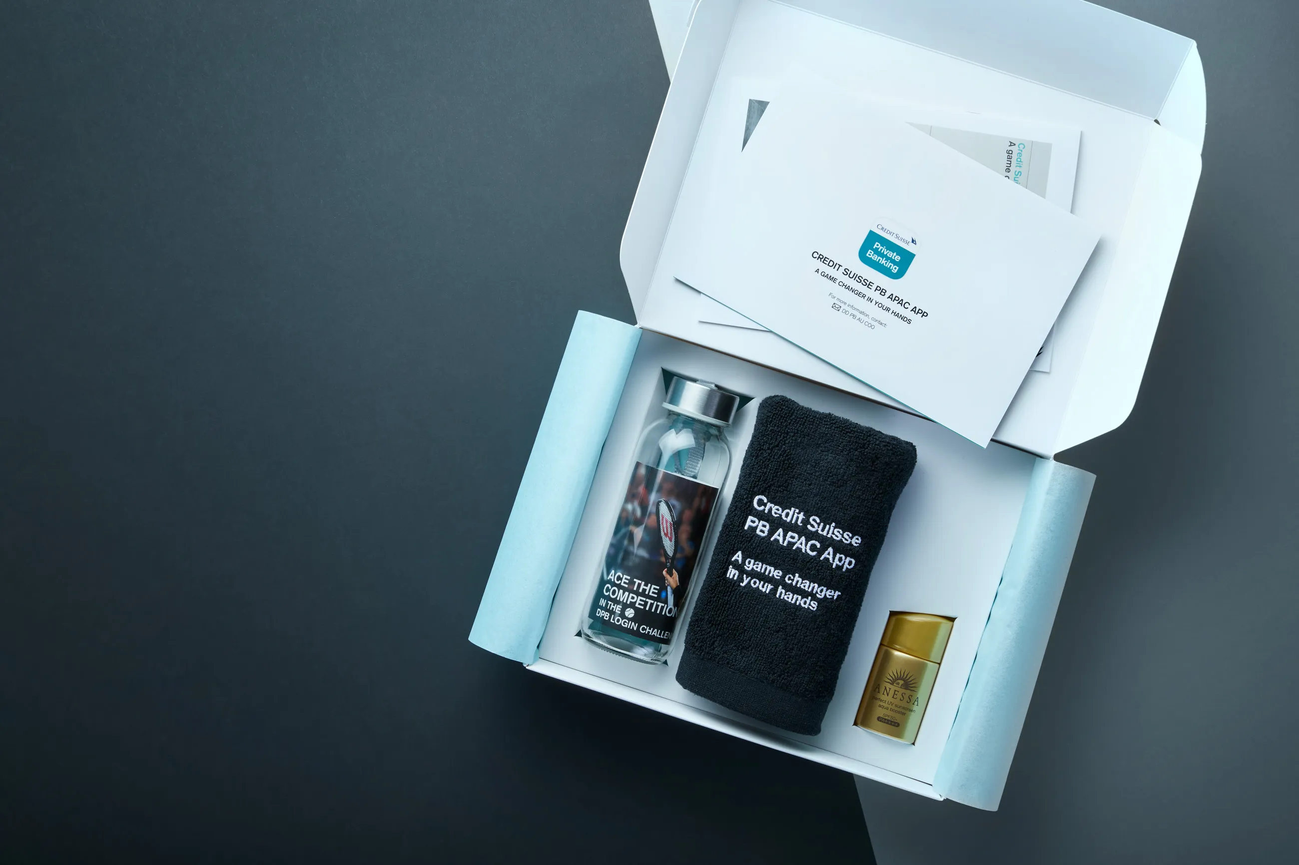 For the Credit Suisse brand to shine through in their media kit, we designed and produced a packaging that balanced